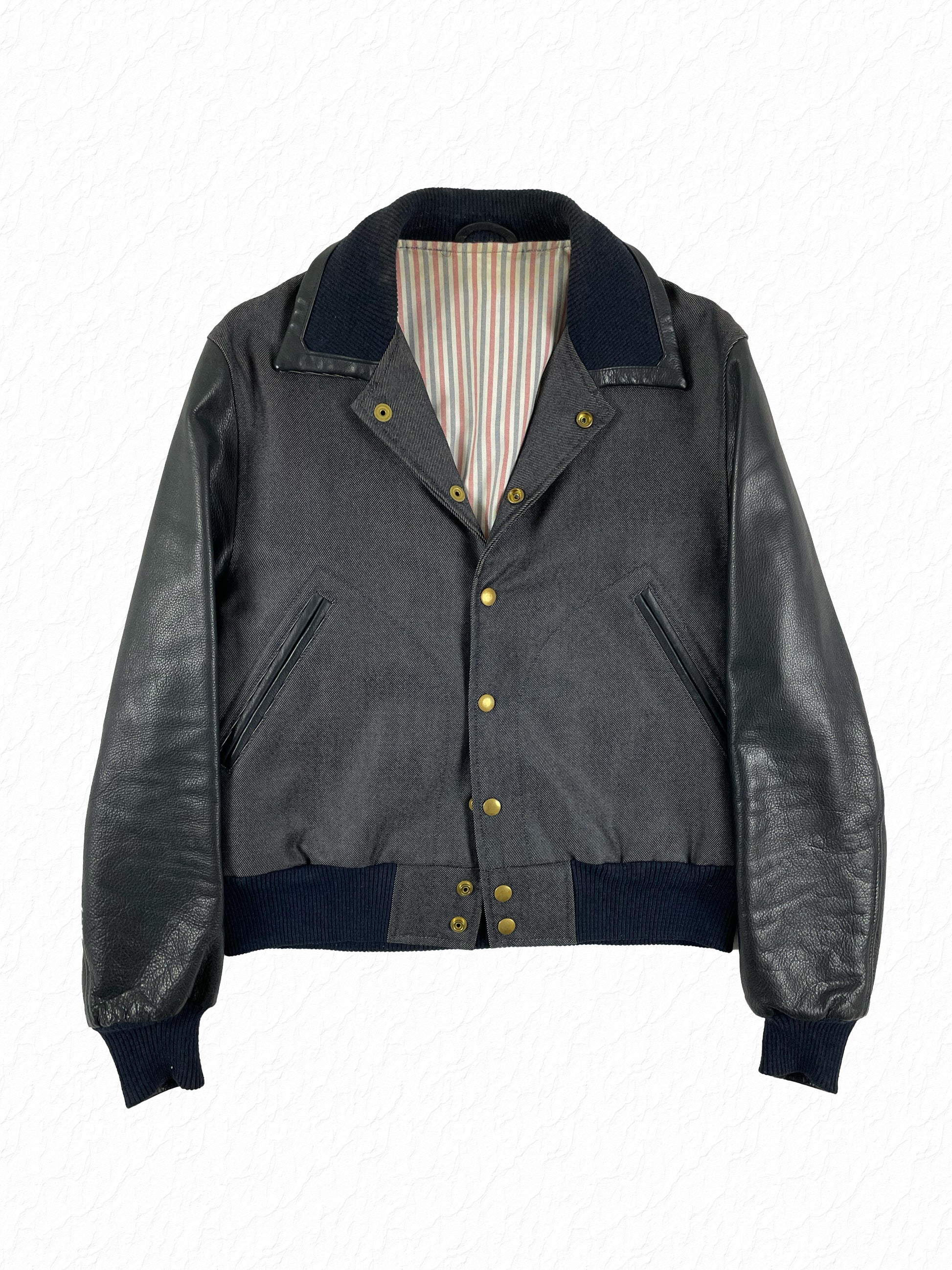 Thom Browne navy denim varsity jacket with black leather sleeves