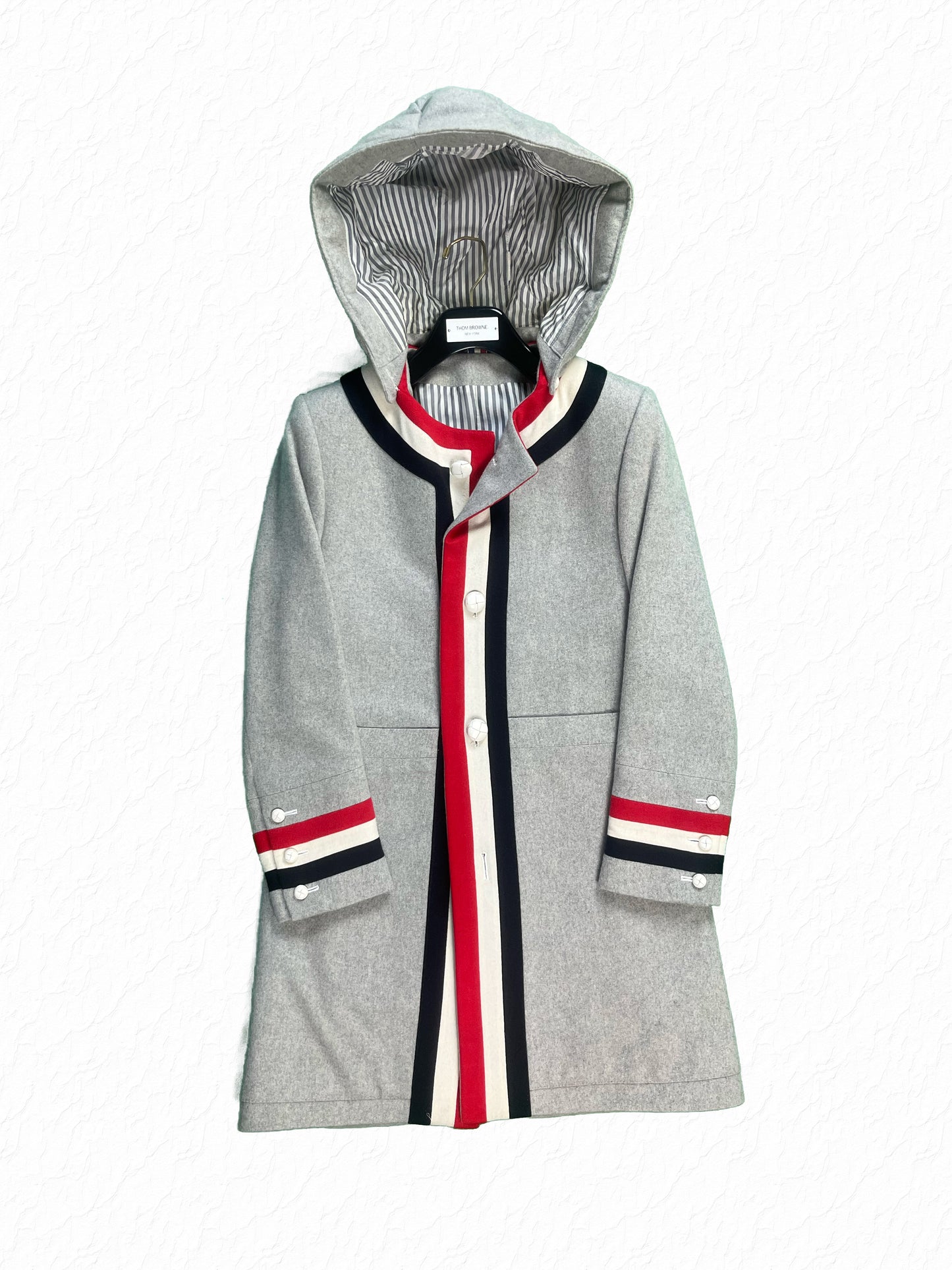 Thom Browne Priest Coat in grey cashmere with red white blue grosgrain placket