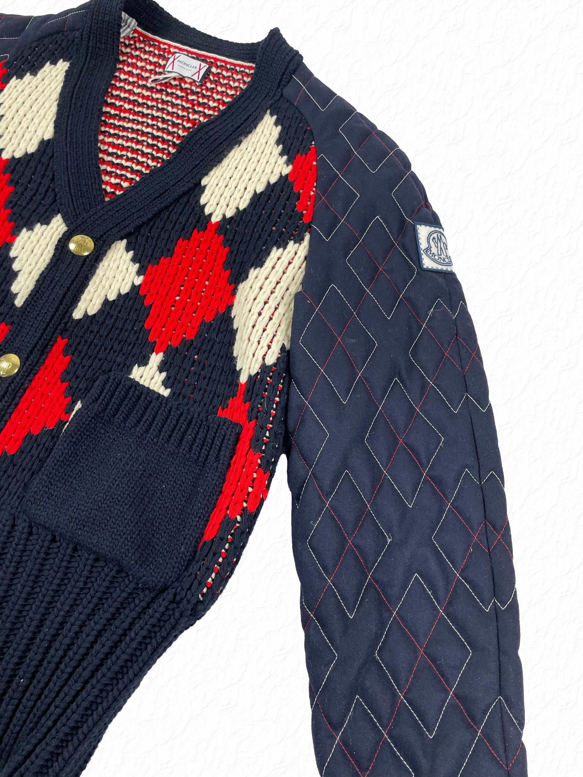 Quilted down sleeves on Moncler Gamme Bleu argyle wool cardigan