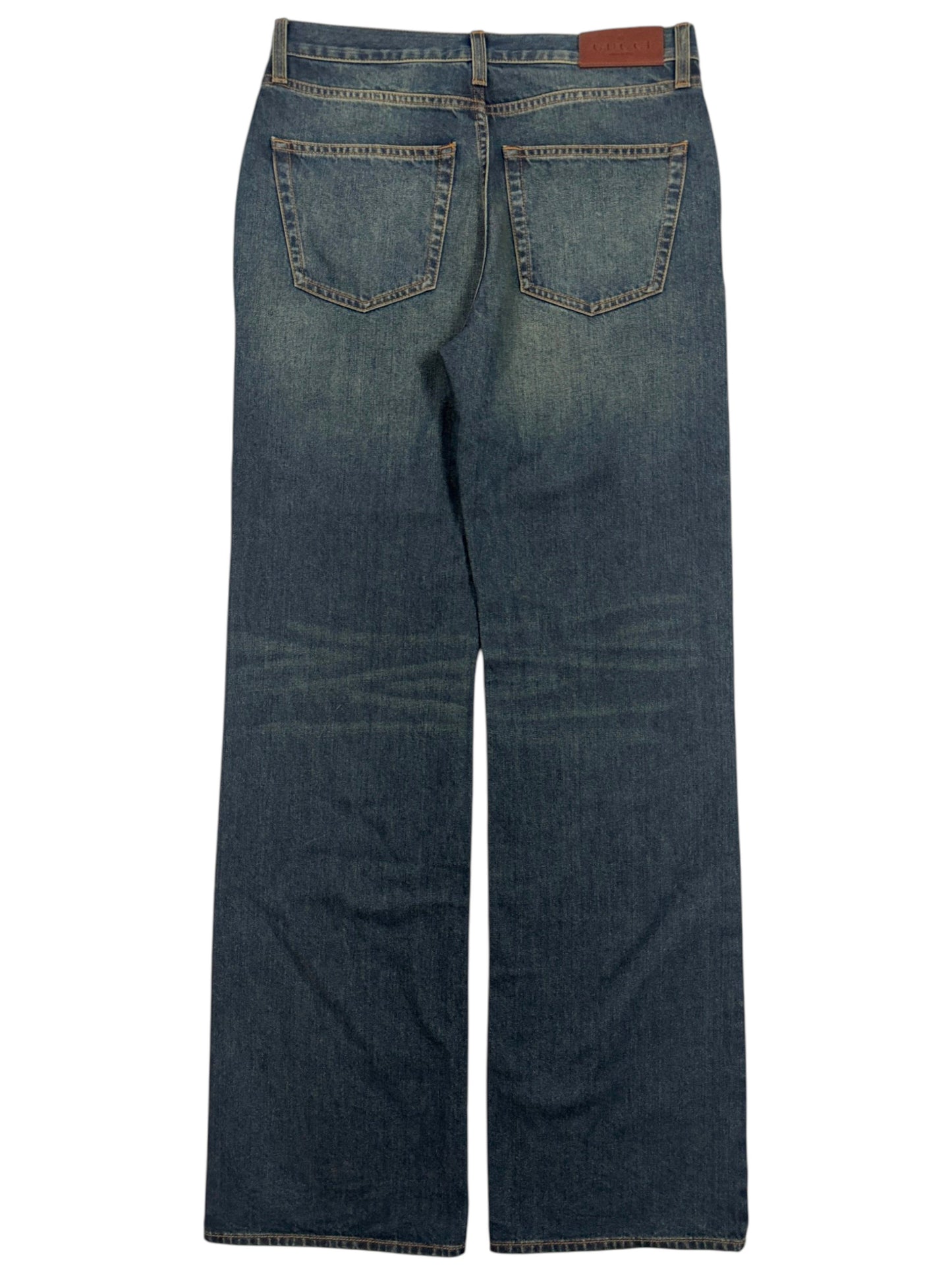 Gucci bootcut denim jeans with faded blue wash and stitched pockets