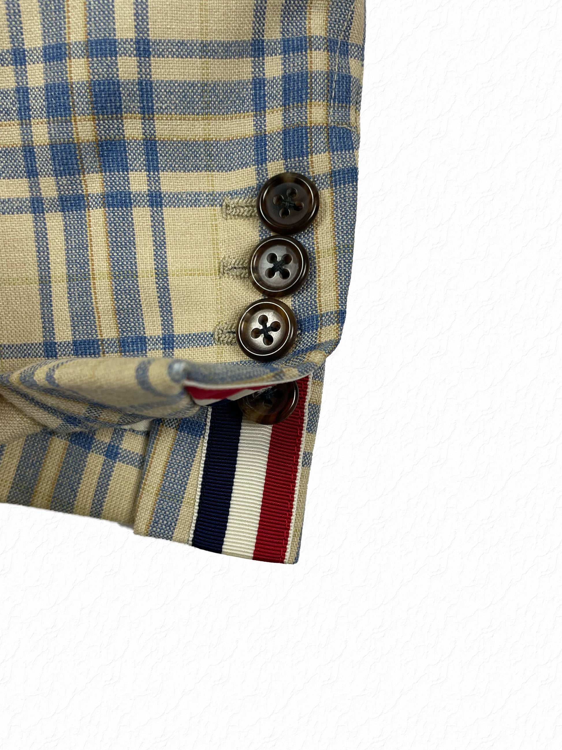 RWB grosgrain tricolor tab on Thom Browne plaid wool sport coat