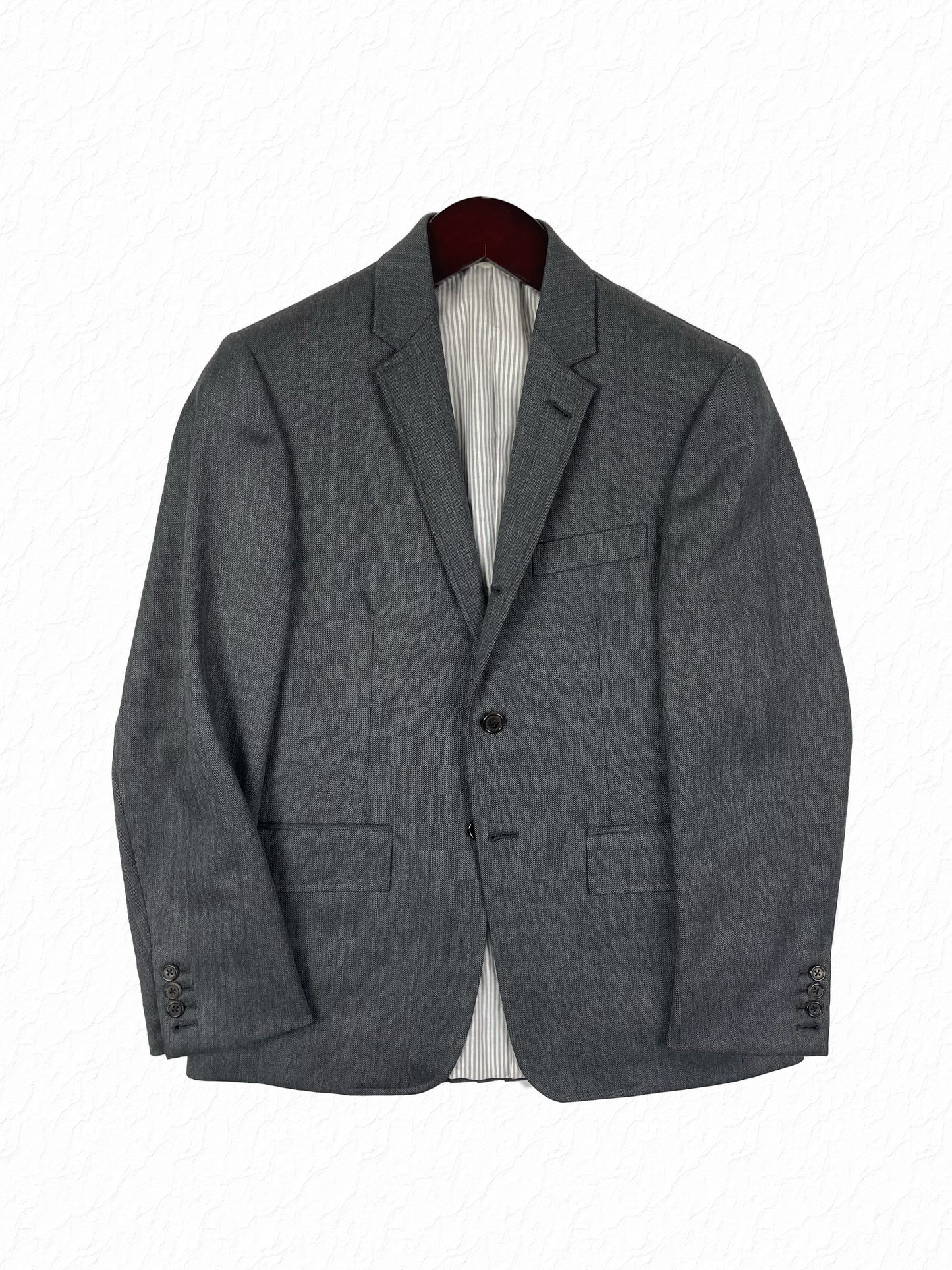 Thom Browne grey herringbone wool blazer with notch lapels