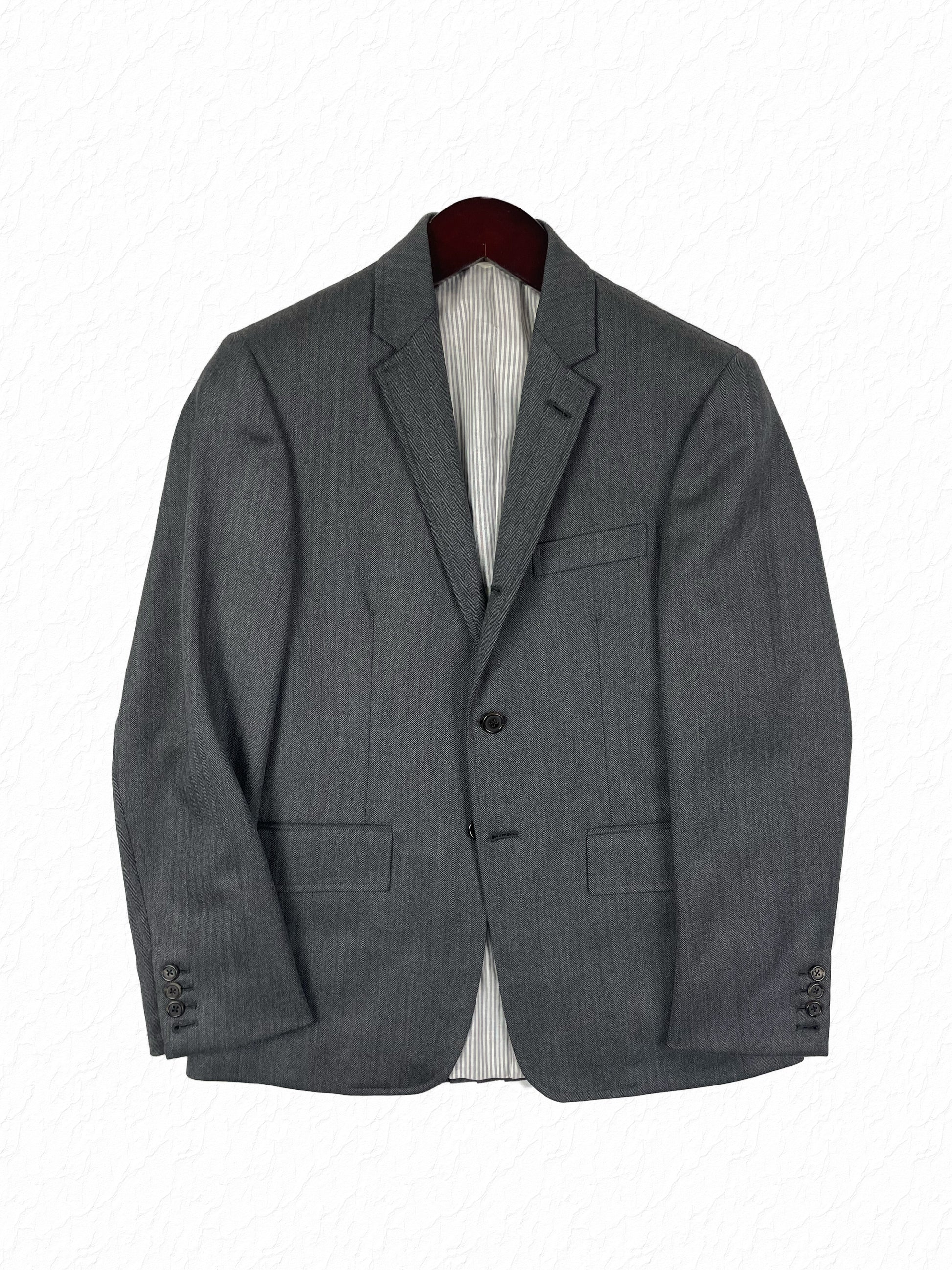Thom Browne grey herringbone wool blazer with notch lapels