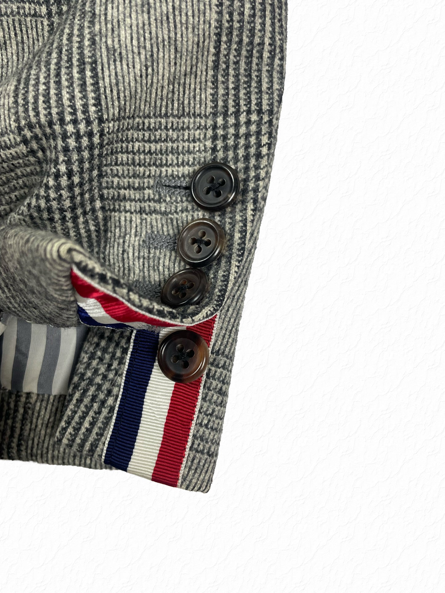 Grey Prince of Wales plaid wool blazer from Thom Browne Fall 2009
