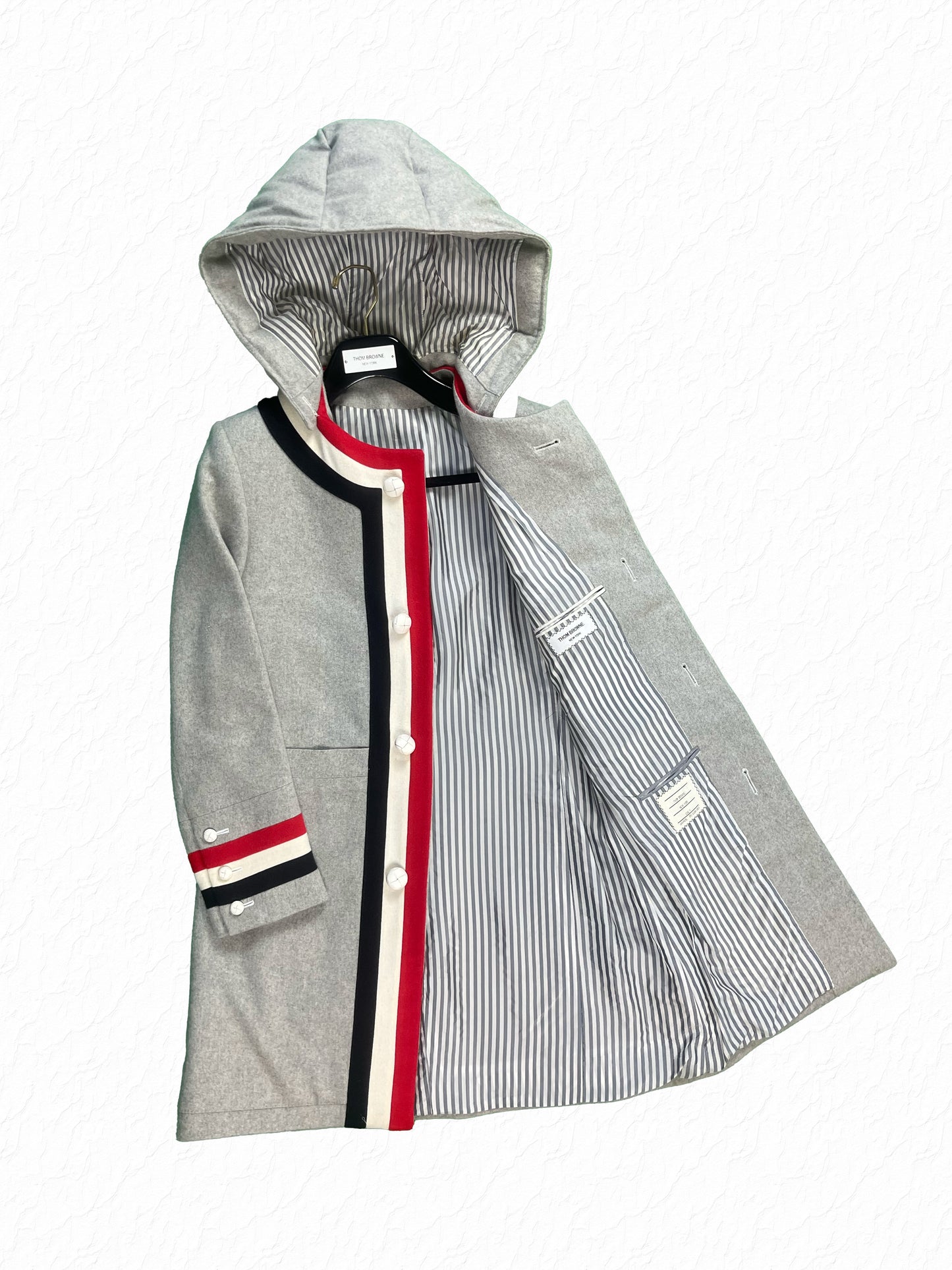 Grey cashmere Thom Browne hooded coat with white leather ball buttons
