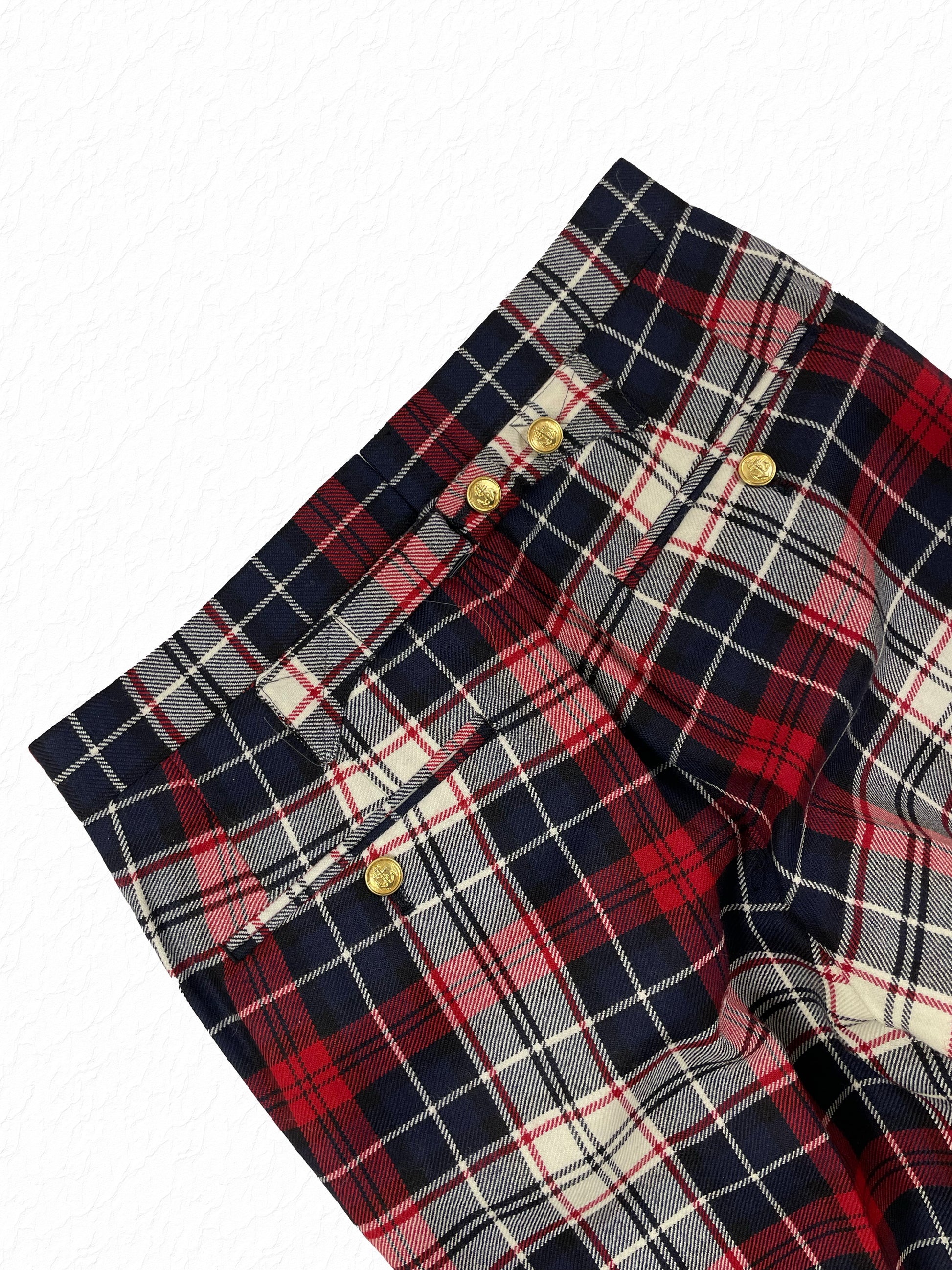 Gold button waistband on Thom Browne Harrison plaid wool trousers