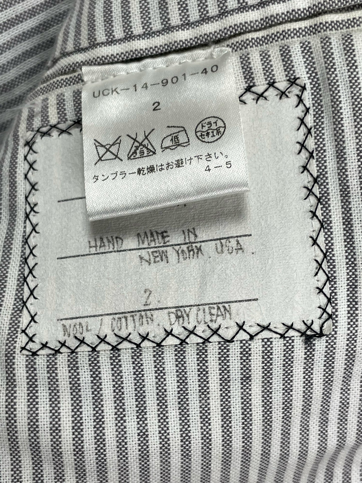 Thom Browne Fall 2007 Chesterfield coat with four-button grosgrain sleeve tabs