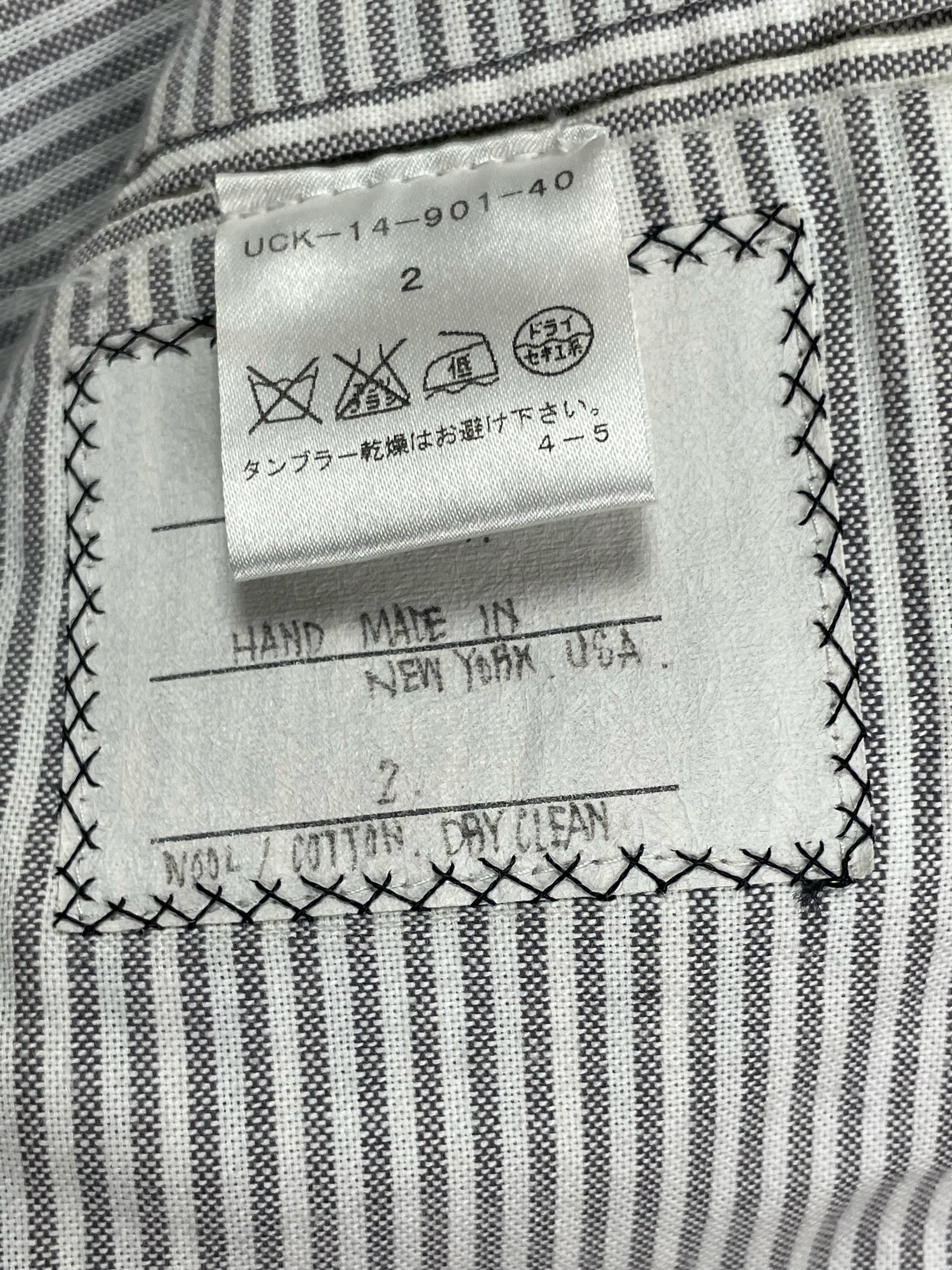 Thom Browne Fall 2007 Chesterfield coat with four-button grosgrain sleeve tabs