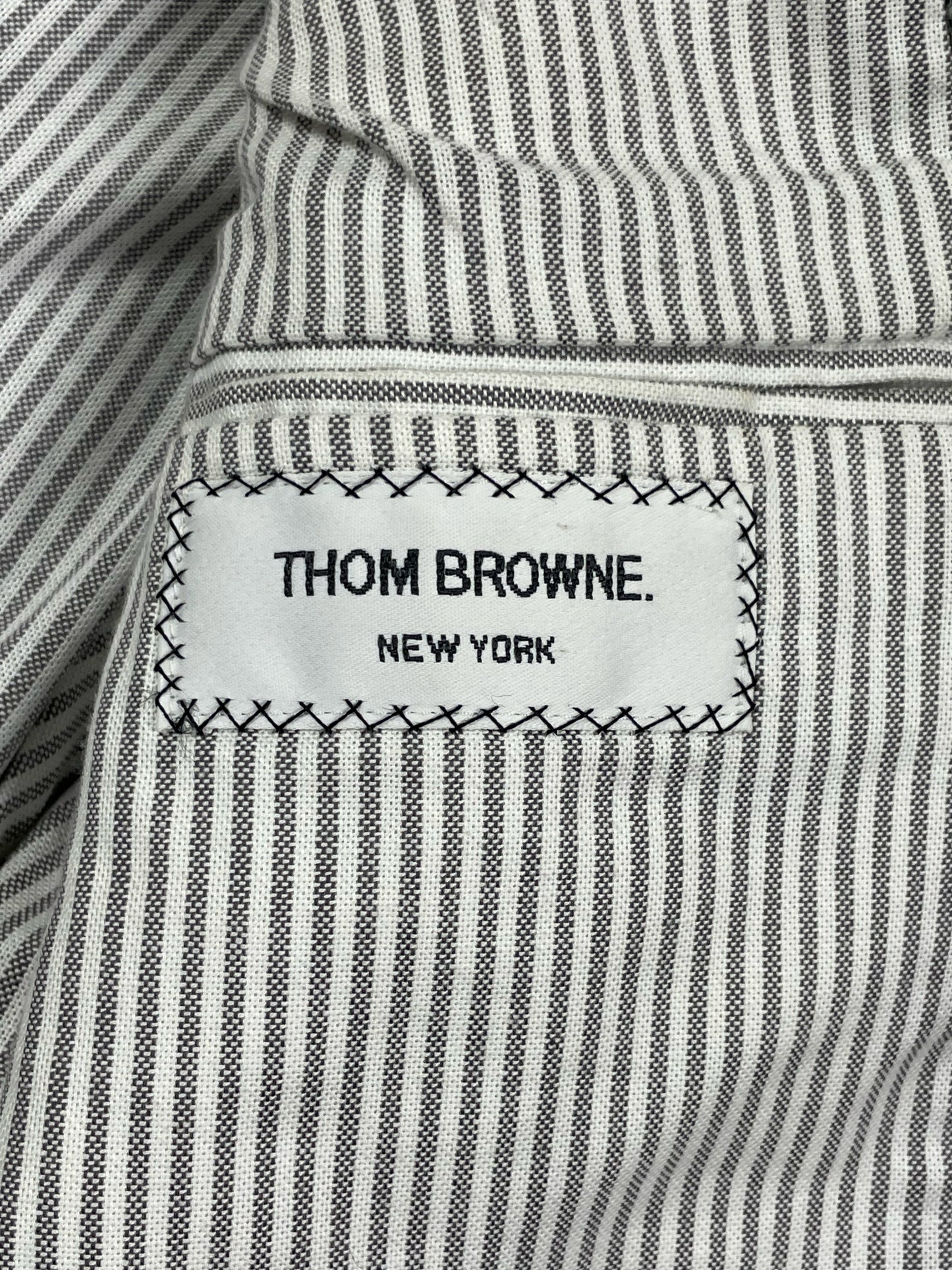 Thom Browne New York label on striped cotton interior