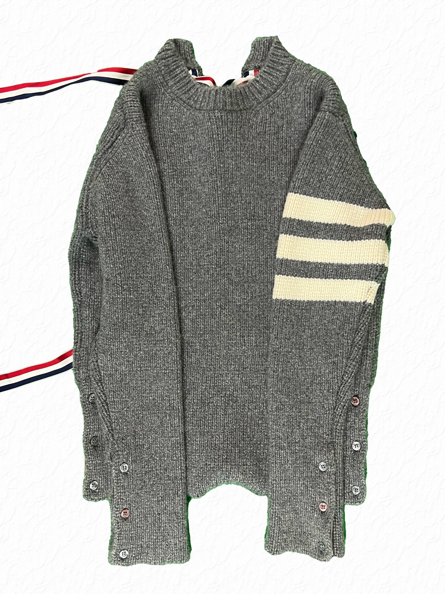Red white blue grosgrain corset lacing on Thom Browne cashmere knit