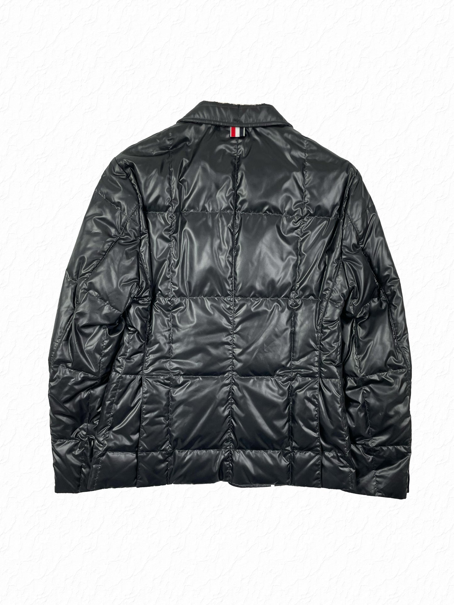 Box quilted black nylon down jacket by Thom Browne