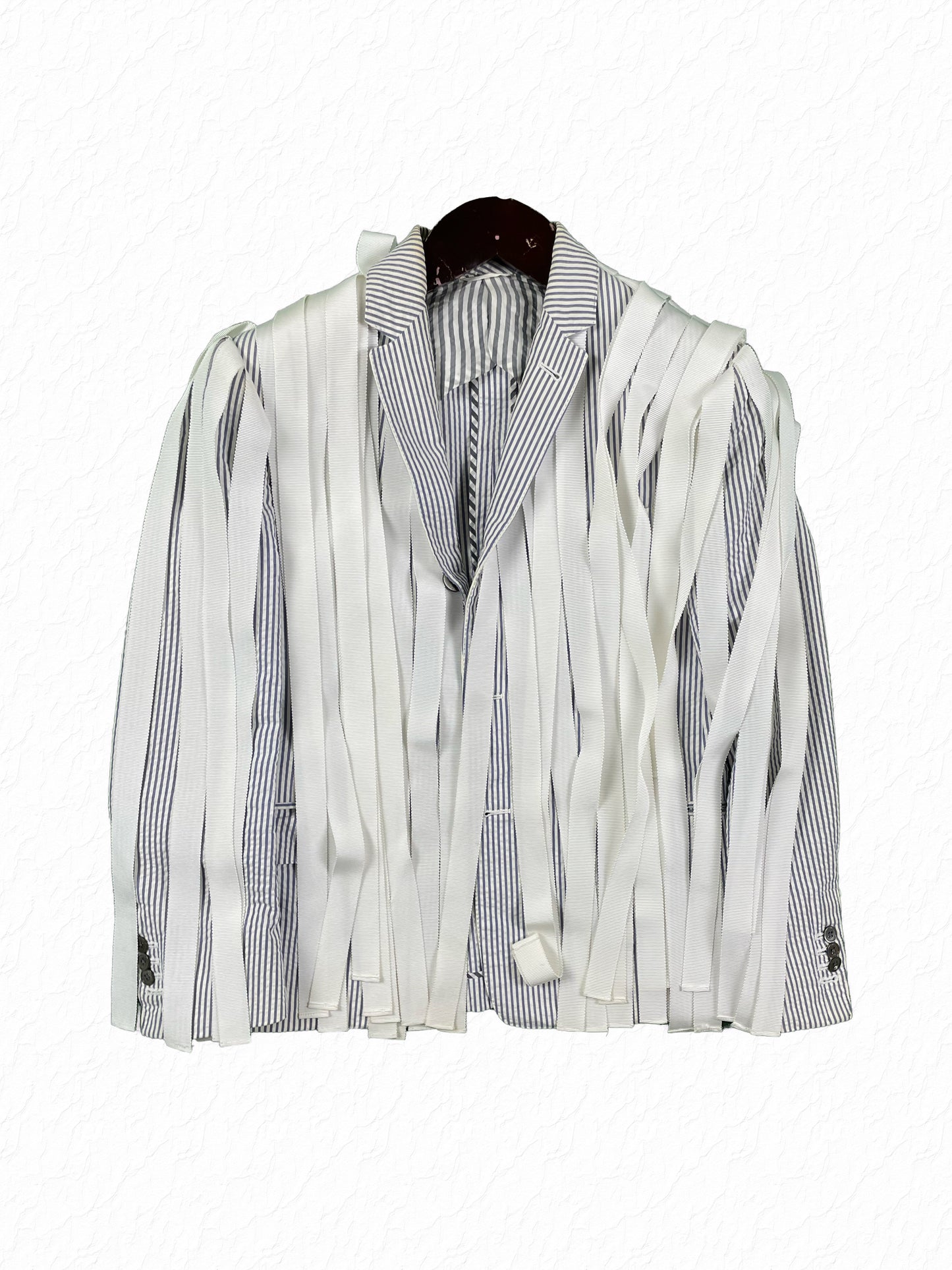 Thom Browne seersucker blazer with white grosgrain lava lava fringe overlay