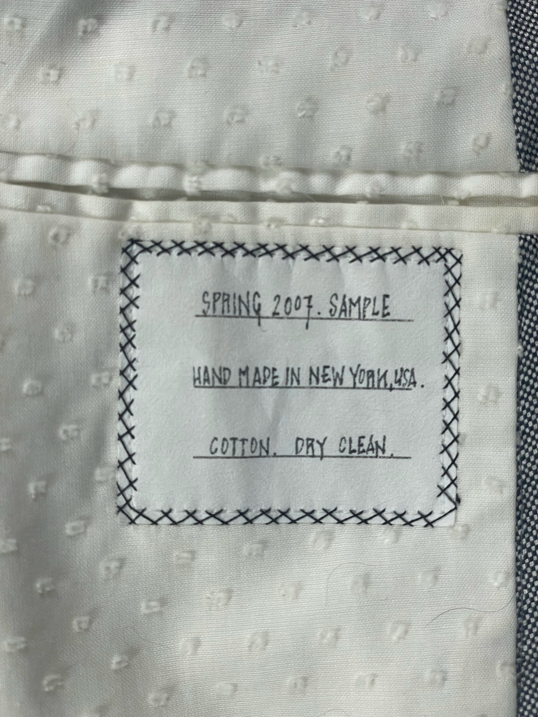 Grey pepper cotton Thom Browne Spring 2007 sleeveless coat with polka dot cotton lining