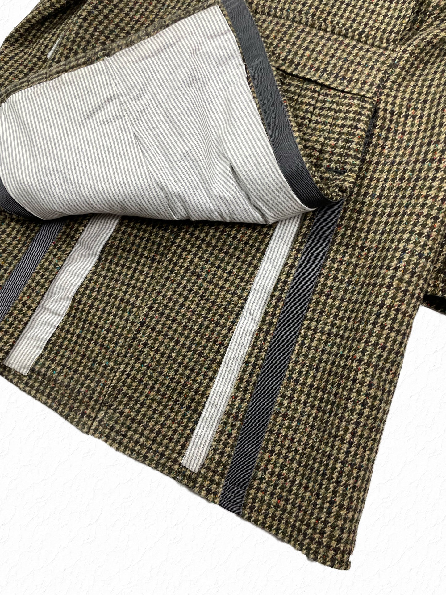 Thom Browne pleated skirted hem on multicolor houndstooth wool Chesterfield coat