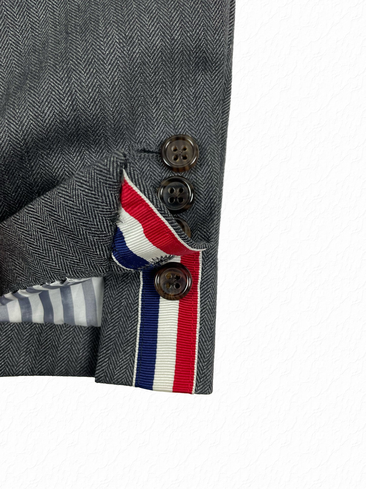 Thom Browne red white blue grosgrain tricolor cuff tab