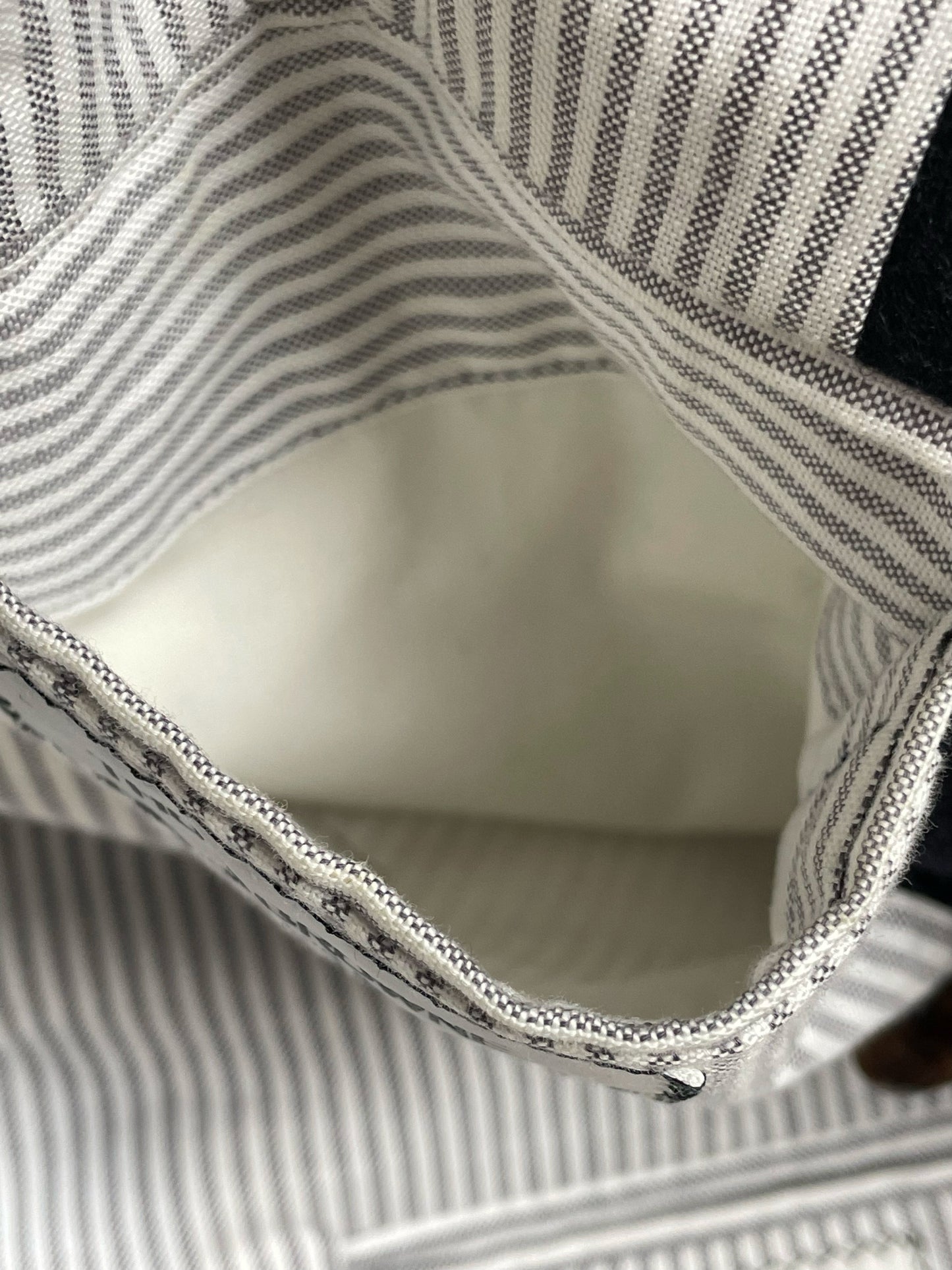 Signature Thom Browne grosgrain tab on navy cashmere tennis button blazer