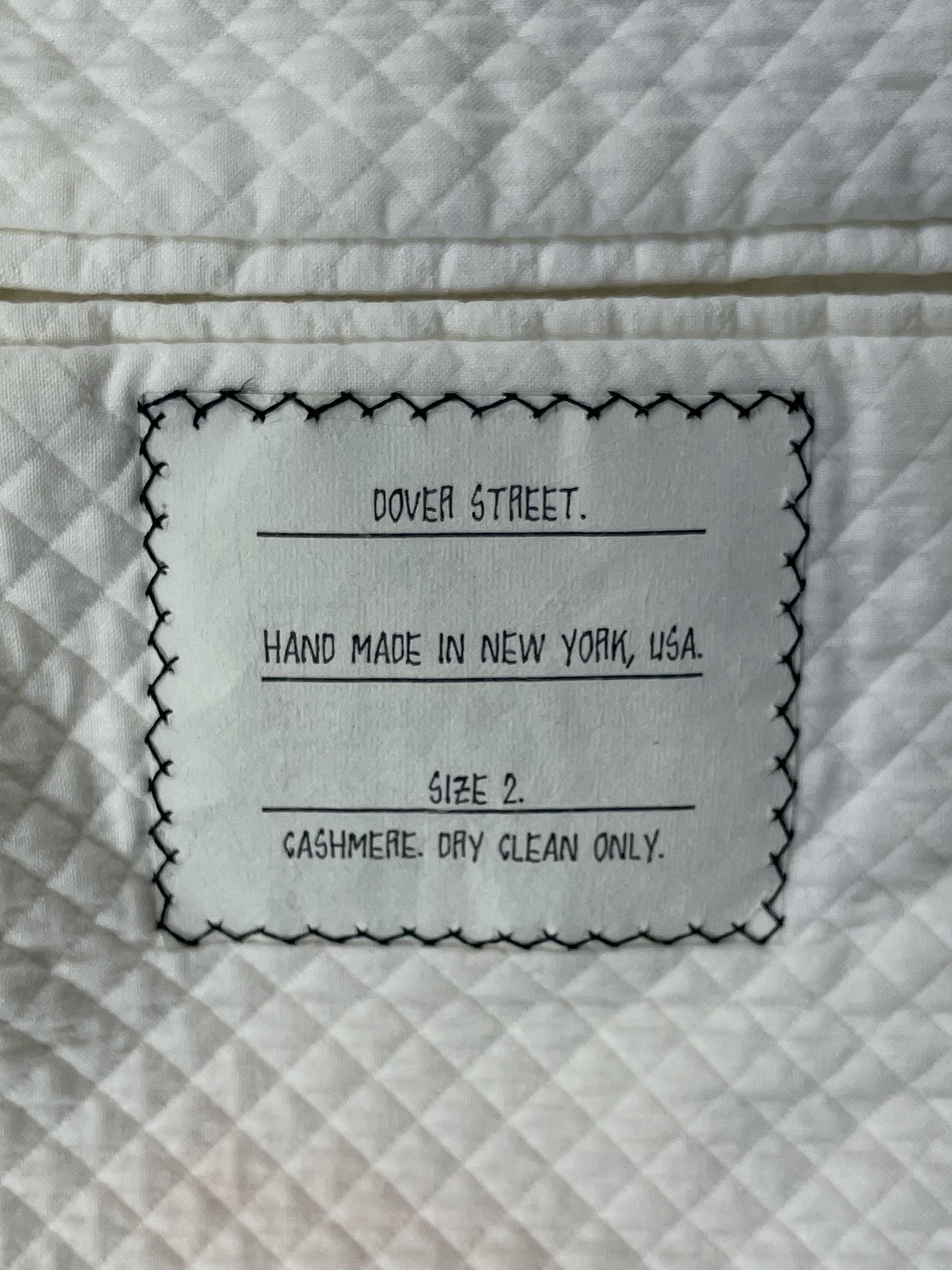Dover Street exclusive cashmere label on quilted cotton lining Thom Browne