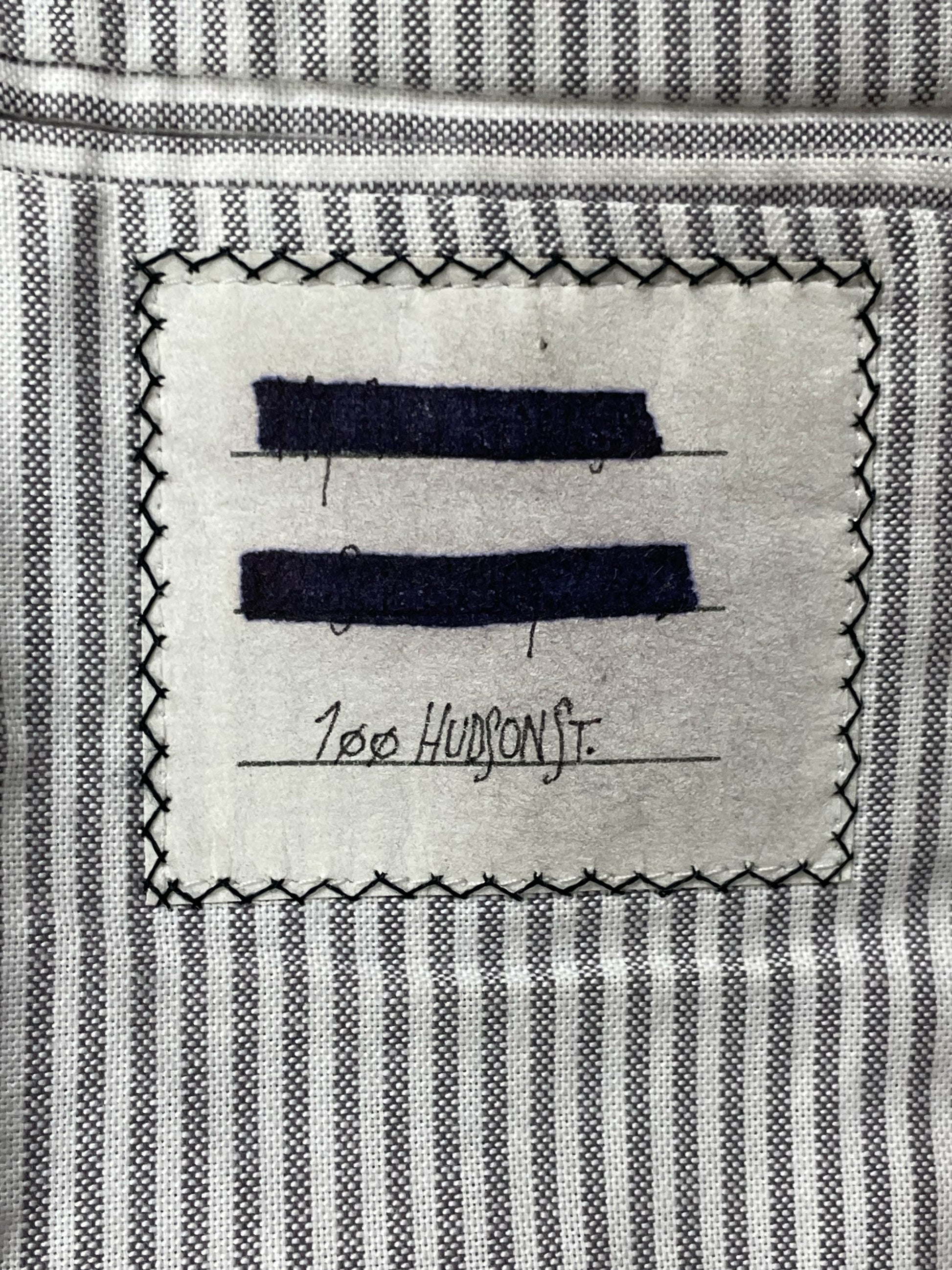 Striped grey cotton lining inside Thom Browne tweed sport coat