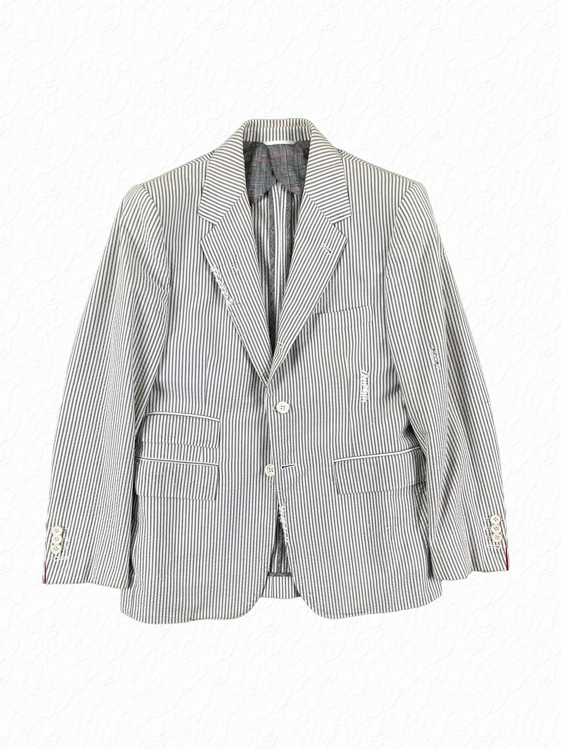 Thom Browne grey seersucker distressed sport coat with white rubber buttons