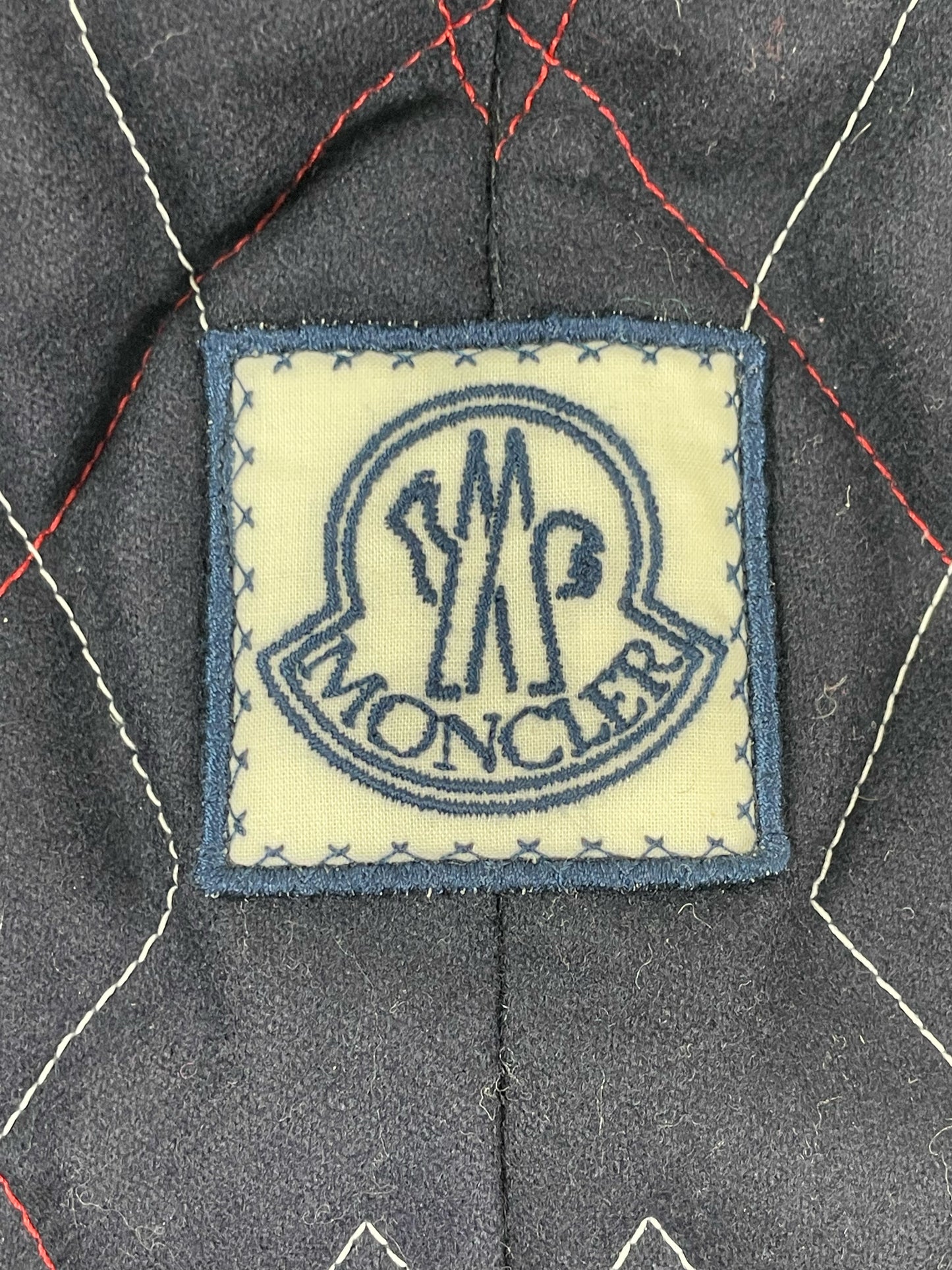 Argyle diamond knit body on Moncler Gamme Bleu wool cardigan