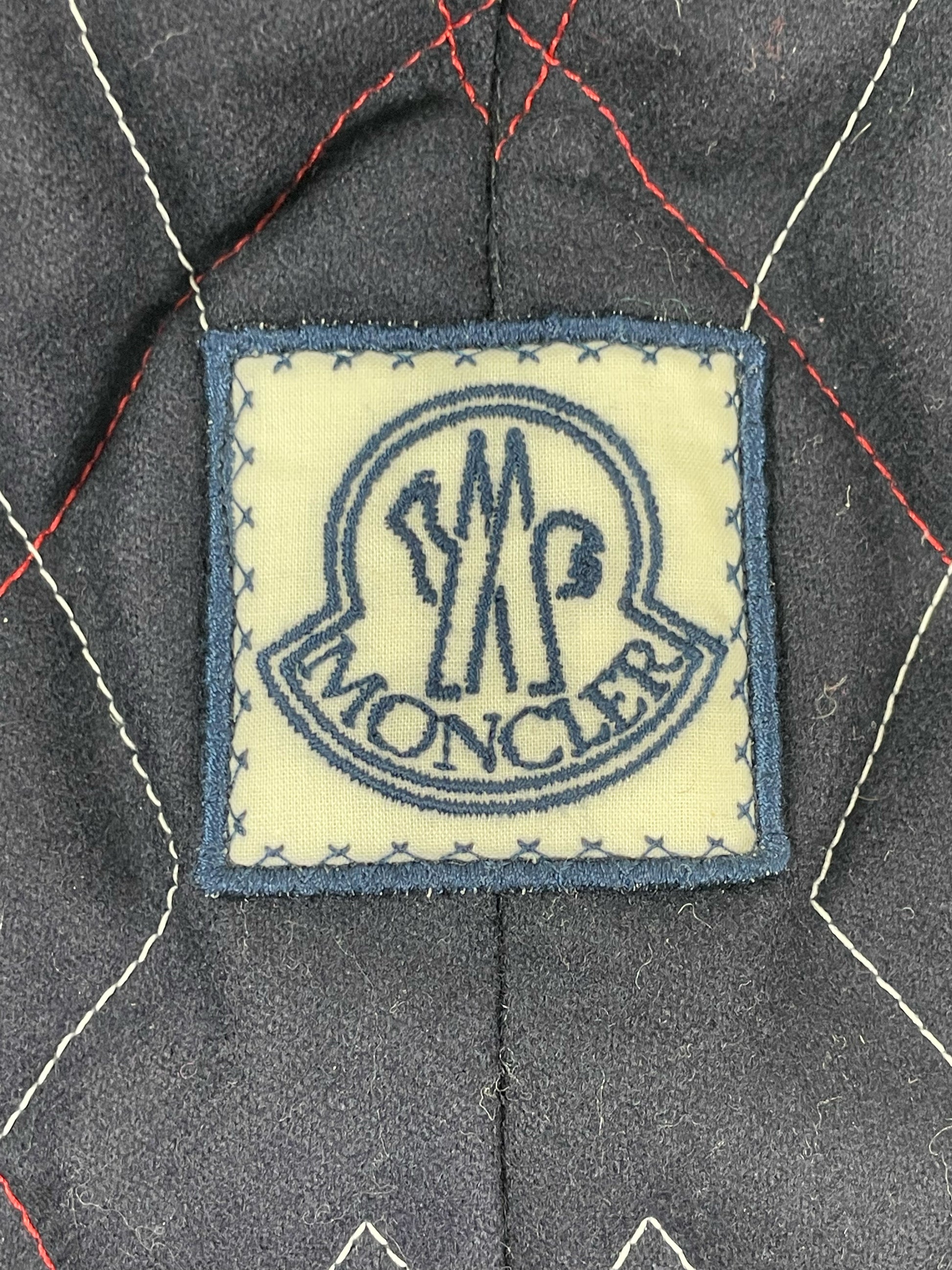 Argyle diamond knit body on Moncler Gamme Bleu wool cardigan