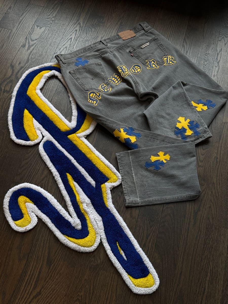 Chrome Hearts New York cross patch denim on the YP logo rug